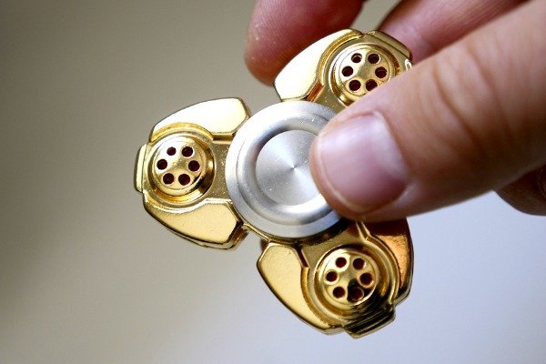 Fidget toys – more specifically, fidget spinners – are all the rage these days, inspiring kids and adults everywhere to figure out how to make a fidget toy themselves. Whether you’re looking for DIY ideas for kids or for teens, big hands or small hands, to help with stress, ADHD, anxiety, autism, or sensory processing disorder, or just to get creative juices flowing with students in the classroom, this collection of DIY fidget toys will NOT disappoint!